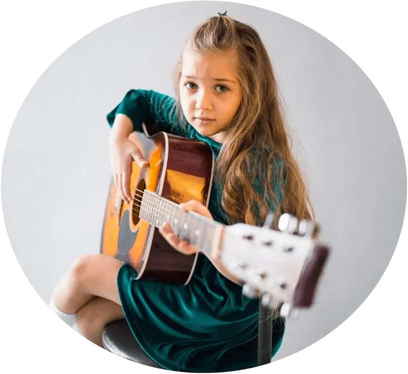 A kid playing Guitar