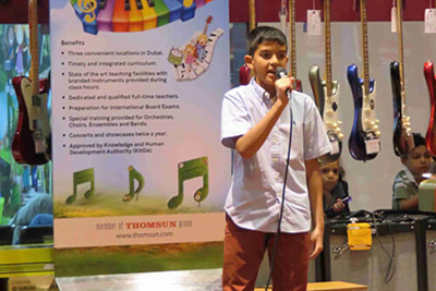 A kid Playing Keyboard