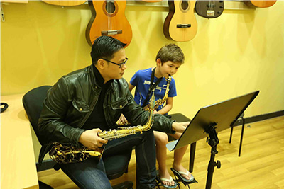 A kid Playing Keyboard